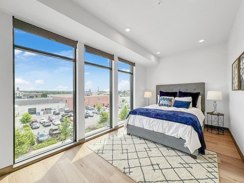A bedroom with a large bed