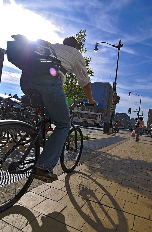 Cyclist at Highland Park at Columbia Heights Metro, Washington
