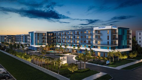 Avery Nest apartments building with trees and street in front.