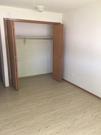 Closet Image of closet with hanger racks - Photo Gallery 6
