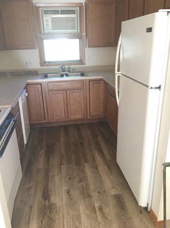 Kitchen Image of stove, fridge, sink, cabinets, and window - Photo Gallery 2