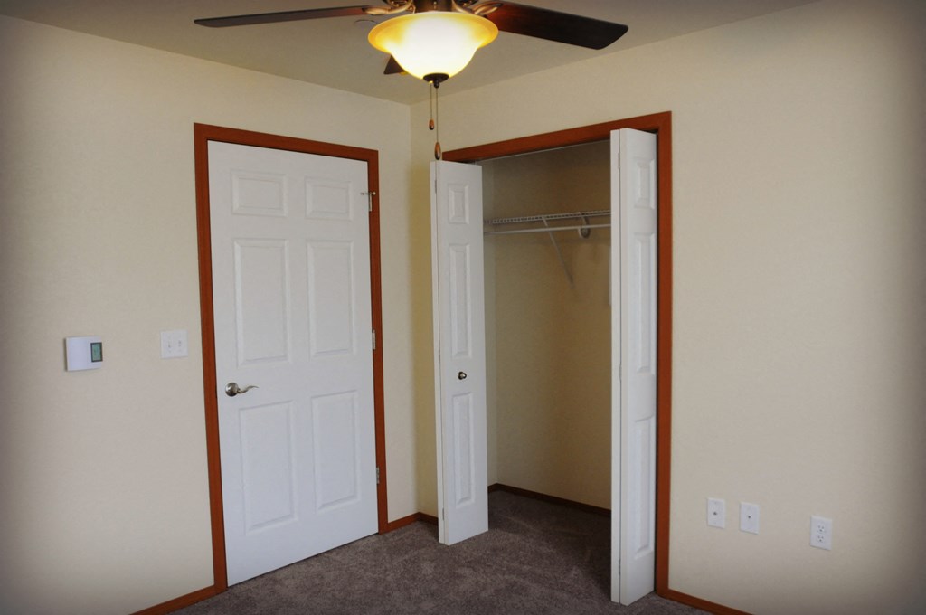 Image of closet with hanger racks