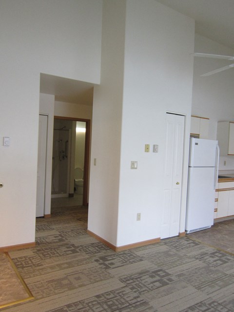 a view of the kitchen from the living room