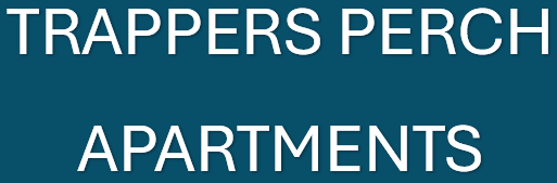 A sign that says "Trappers Perch Apartments".