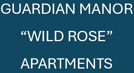 A sign that says Guardian Manor Wild Rose Apartments.