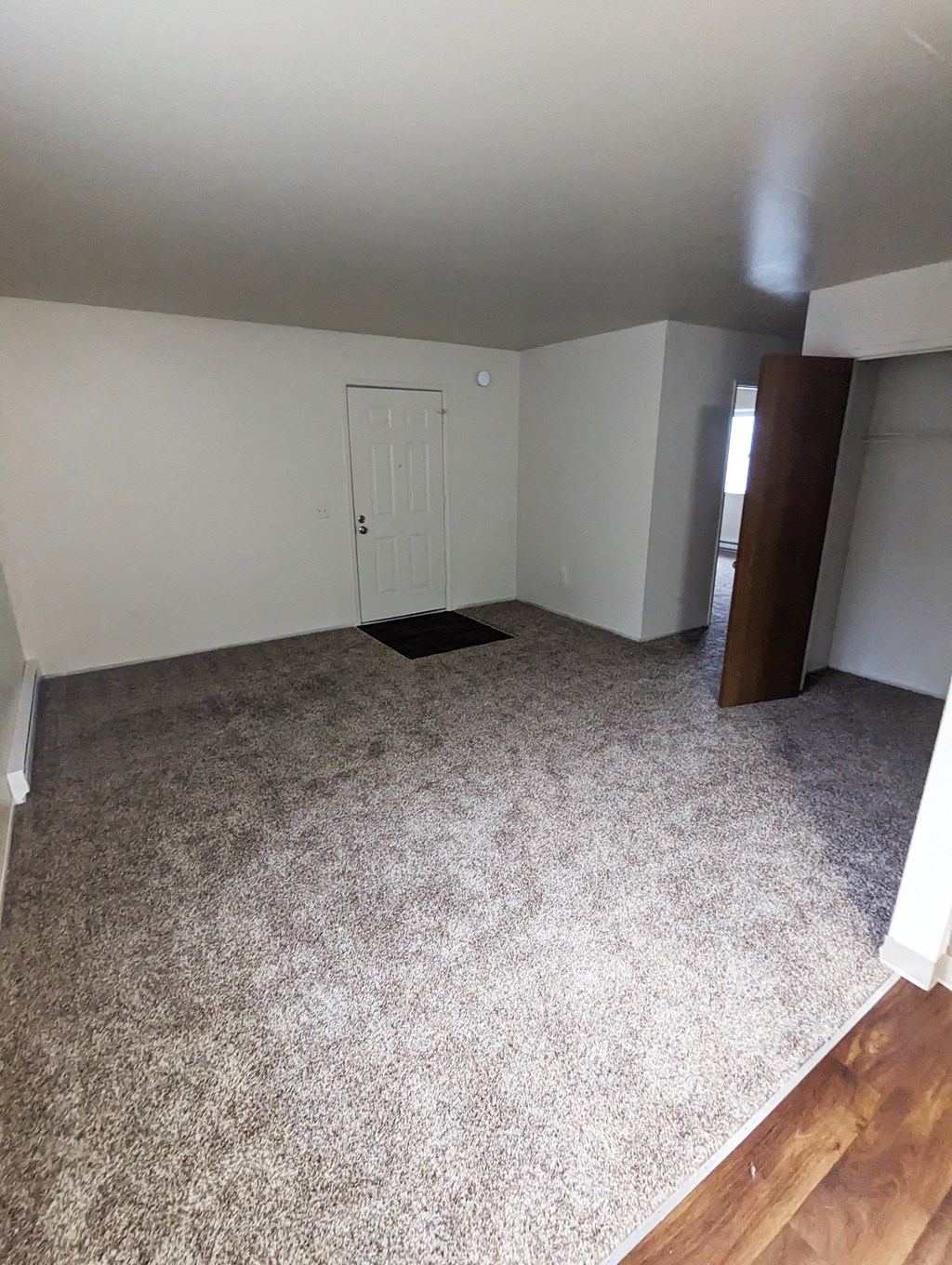 Image of living room looking out from kitchen.