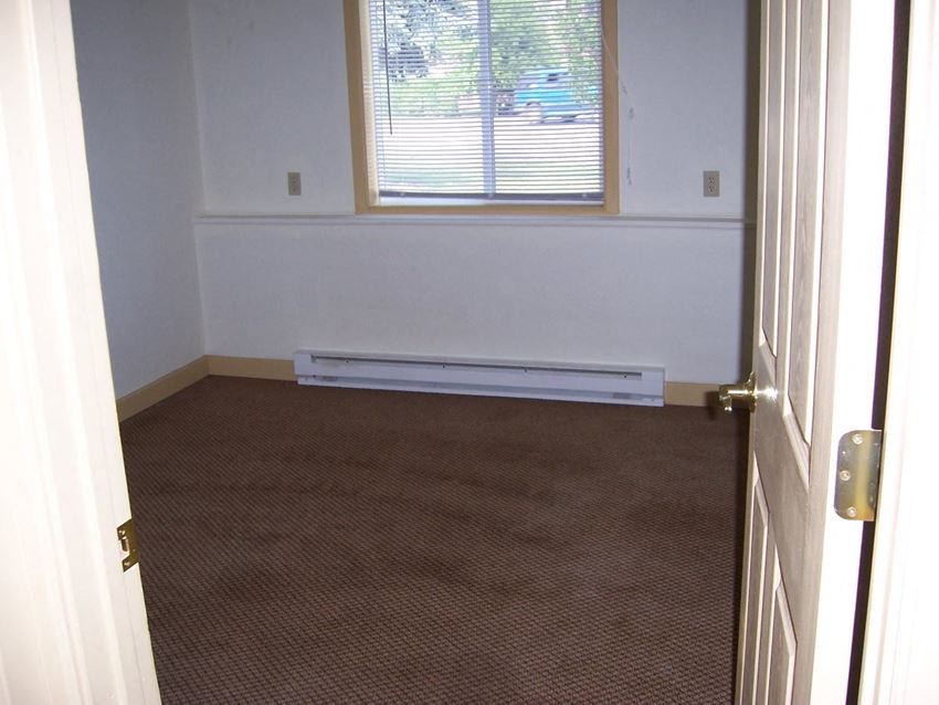 Bedroom Image of room with one window and one baseboard heater - Photo Gallery