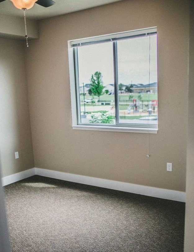 an bedroom room with a large window