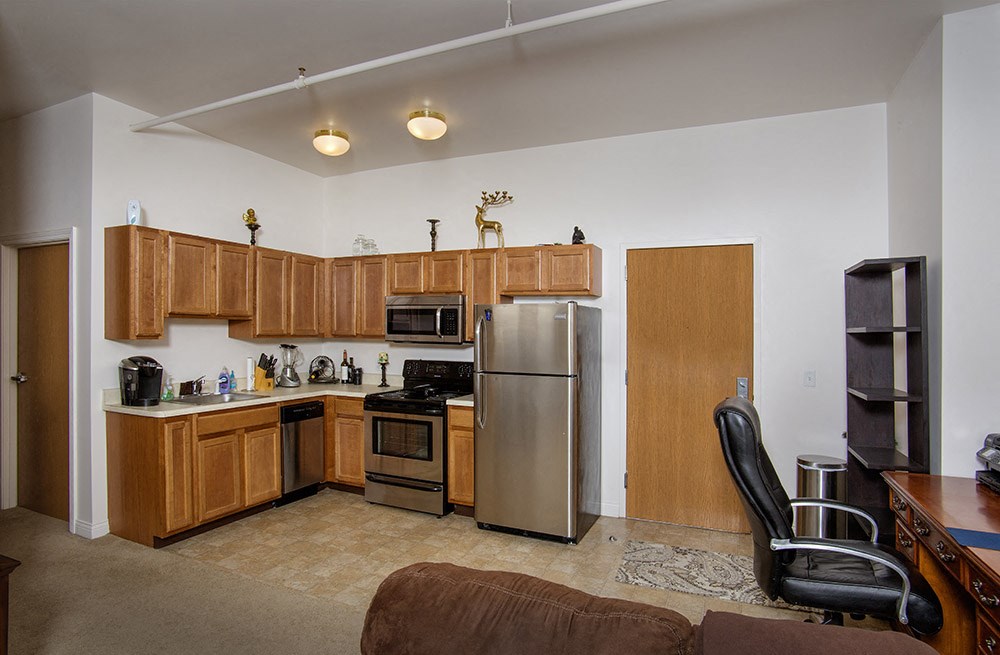 Spacious kitchen with appliances at the Lofts at 5 Lyon, in downtown Grand Rapids, MI