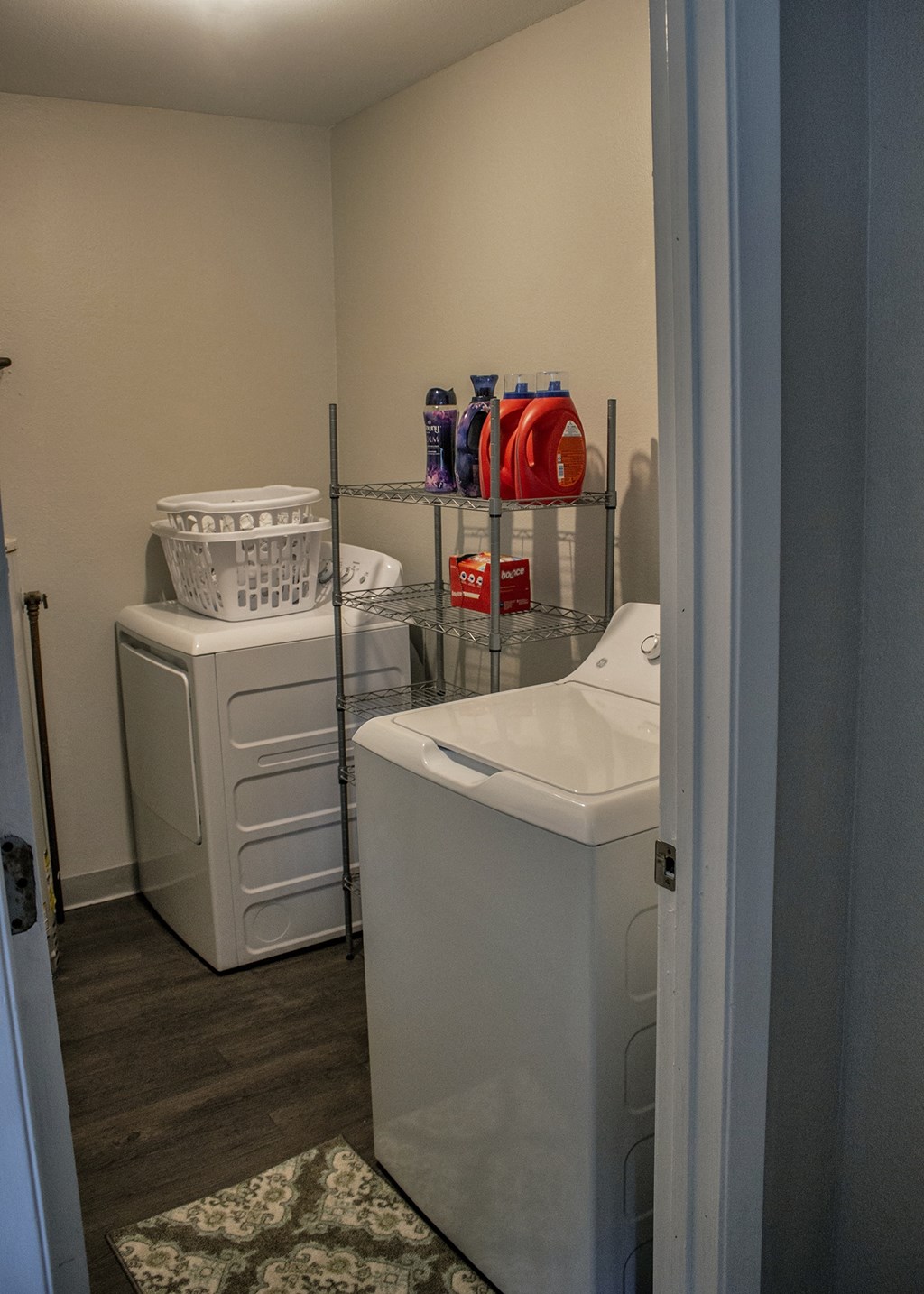 a small laundry room with a washer and dryer