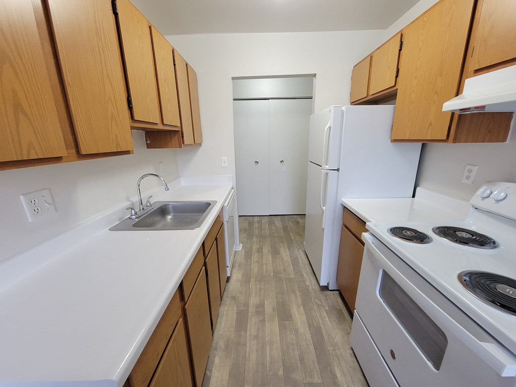 fully equipped kitchen with appliances at Garfield Commons Apts in Clinton Township, MI