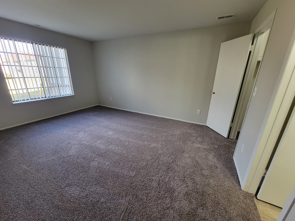 Large and spacious bedroom at Garfield Commons in Clinton Twp, Michigan