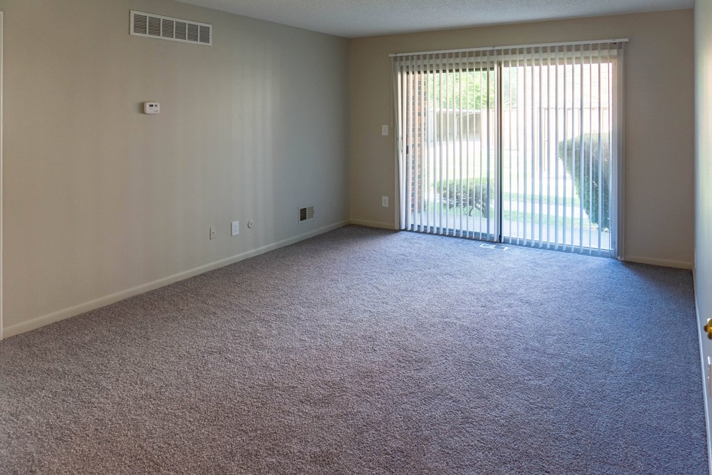 Spacious living space at Carriage House Apartments in Flint, Michigan