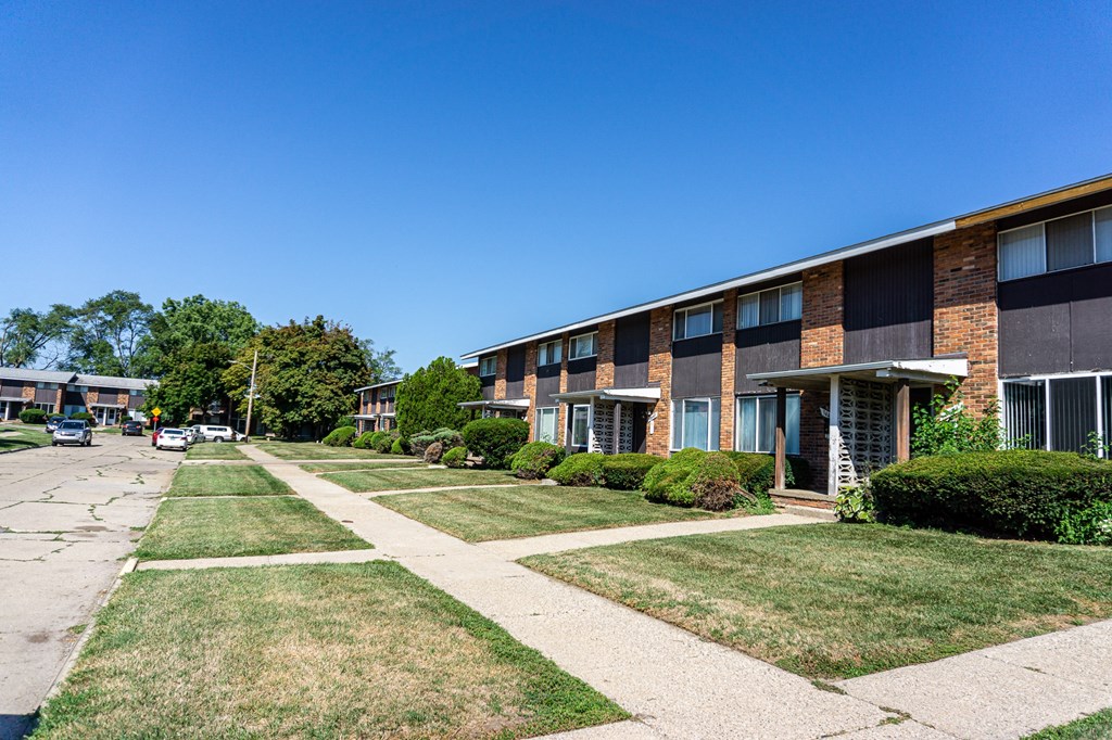 Sidewalks and building exteriors at Carriage House Apartments in Flint, Michigan