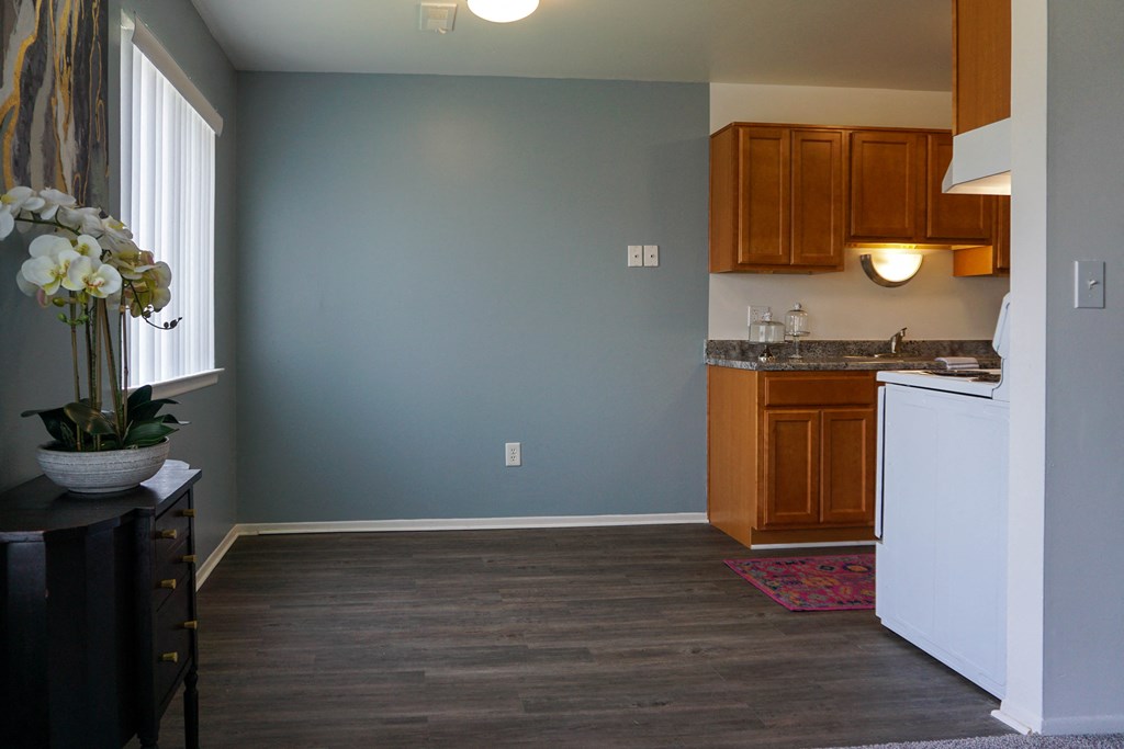 Open Dining Room with hardwood floors and easy access to Kitchen, at Gale Gardens Apartments