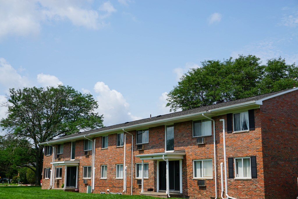 Apartment building with windows and entry doors, at Gale Gardens Apartments