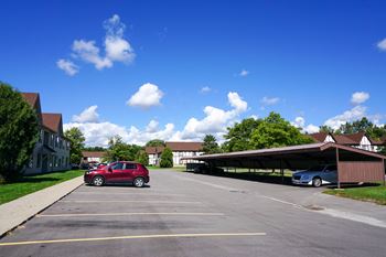 Ample parking with carports, at Garfield Commons