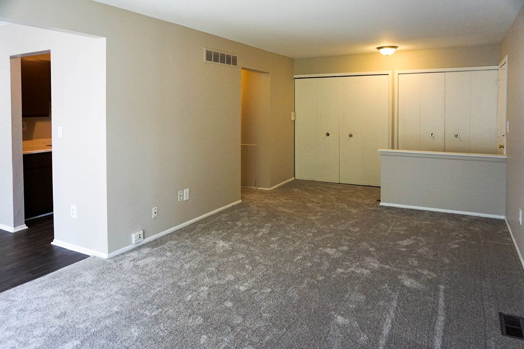 Spacious open living room at Riverstone Apartments in Southfield, Michigan
