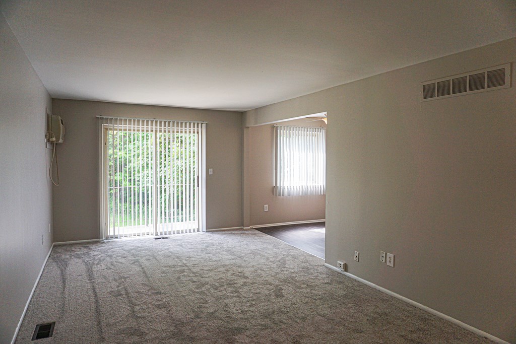 Spacious open living room at Riverstone Apartments in Southfield, Michigan