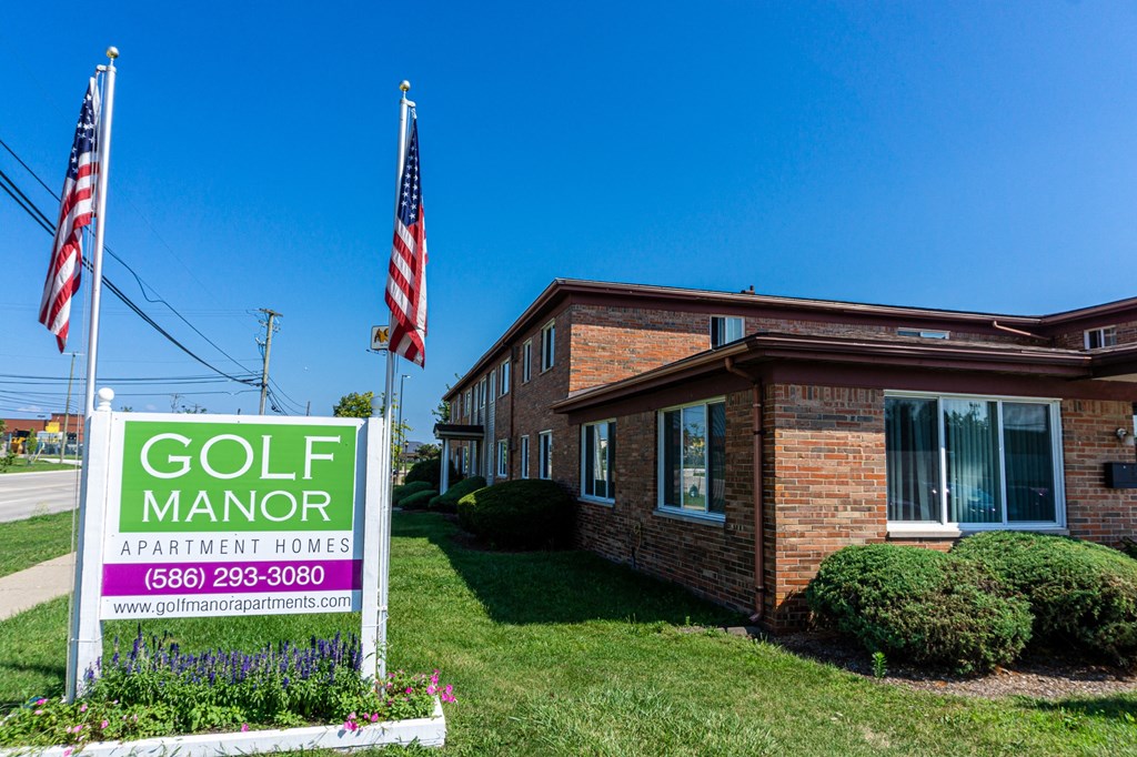 Entrance and exterior apartments at Golf Manor Apartments in Roseville, Michigan