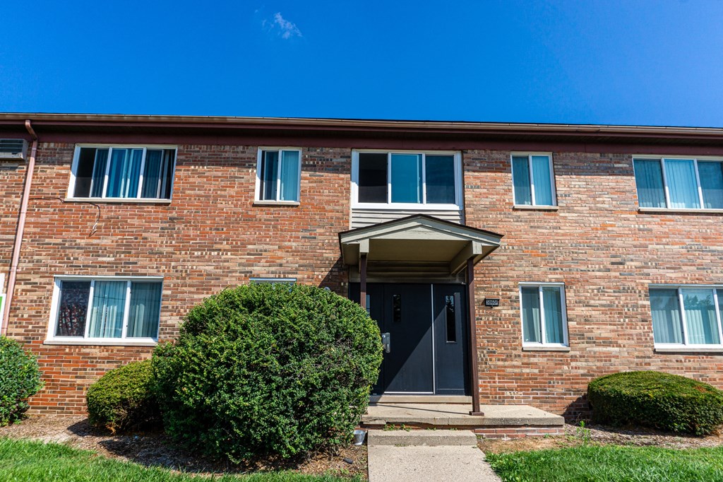 Apartment building entrance at Golf Manor Apartments in Roseville, Michigan