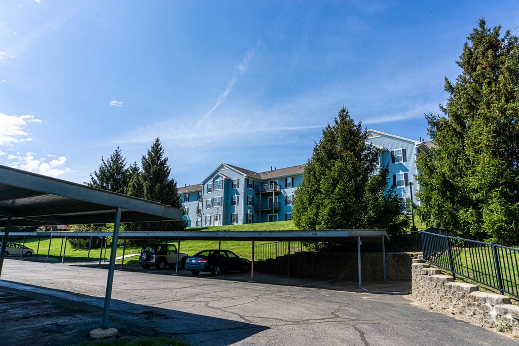 Ample parking spaces with car ports apartments for rent in Kalamazoo, MI near WMU Western Michigan University