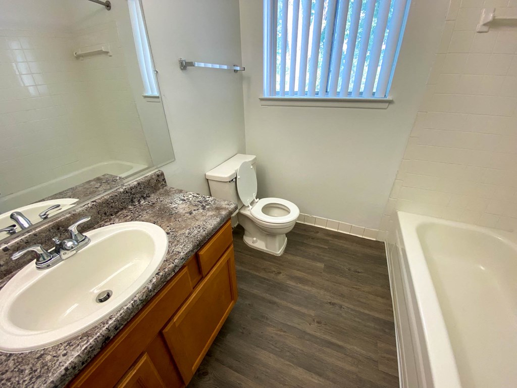 Bathroom with granite coutertop, at Gale Gardens Apartments