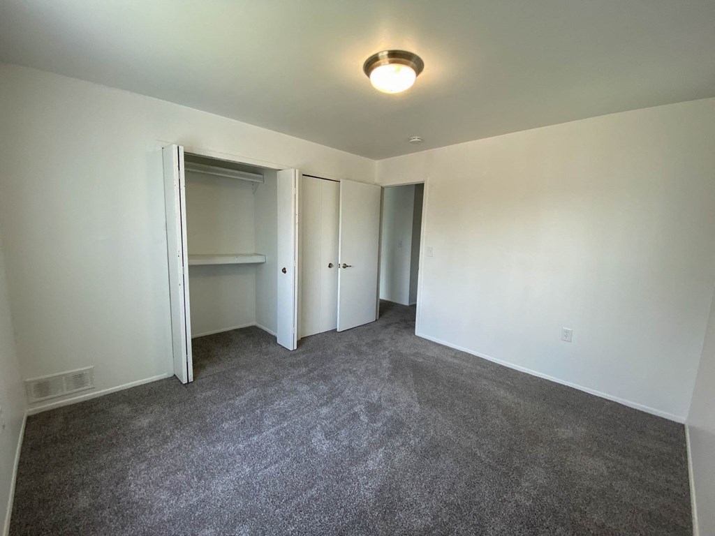 Spacious Bedroom with closets at Gale Gardens Apartments