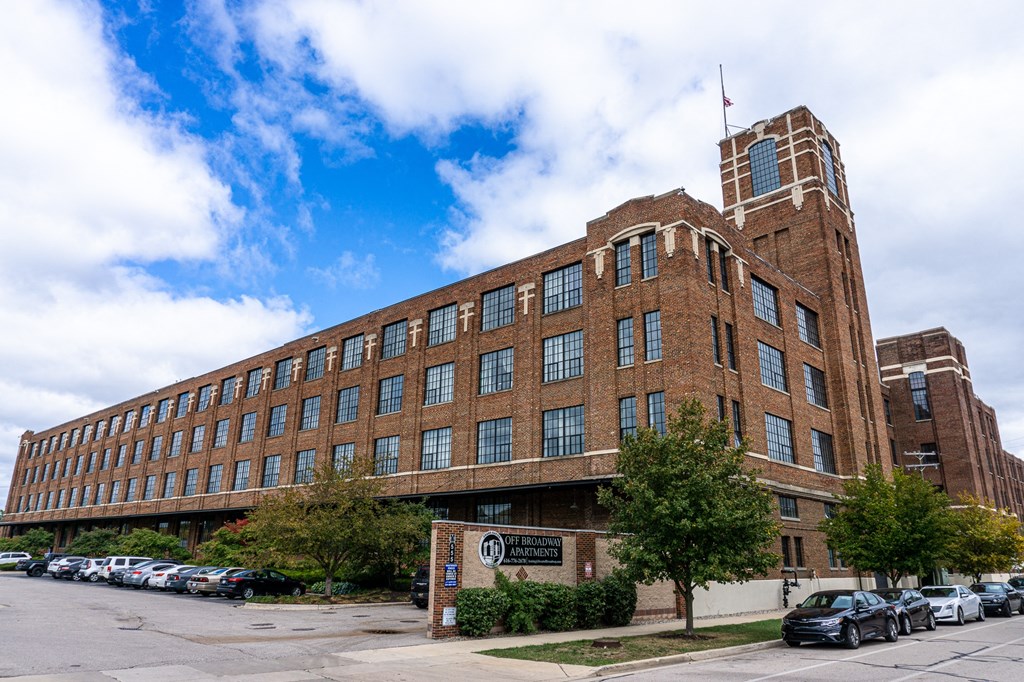 a large brick building with a clock tower