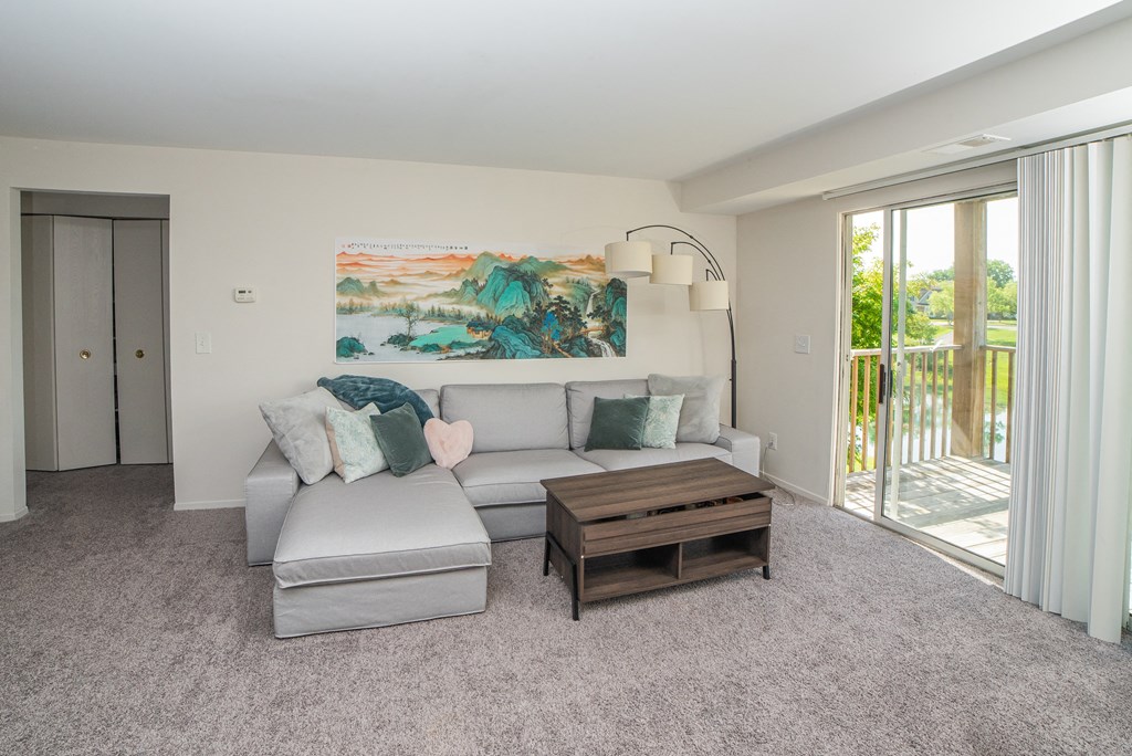 Spacious and cozy living room at Cambridge Club Apartments in Ann Arbor, Michigan