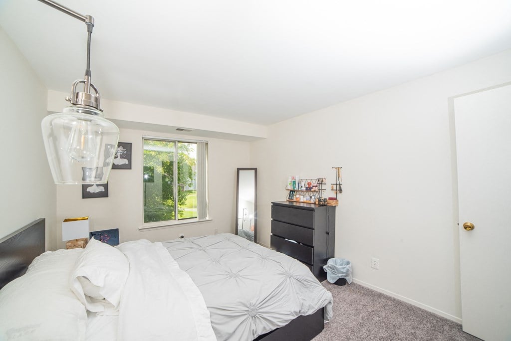 Spacious bedroom at Cambridge Club Apartments in Ann Arbor, Michigan