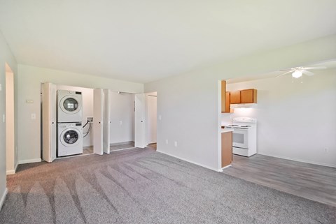 A room with a washer and dryer in it.