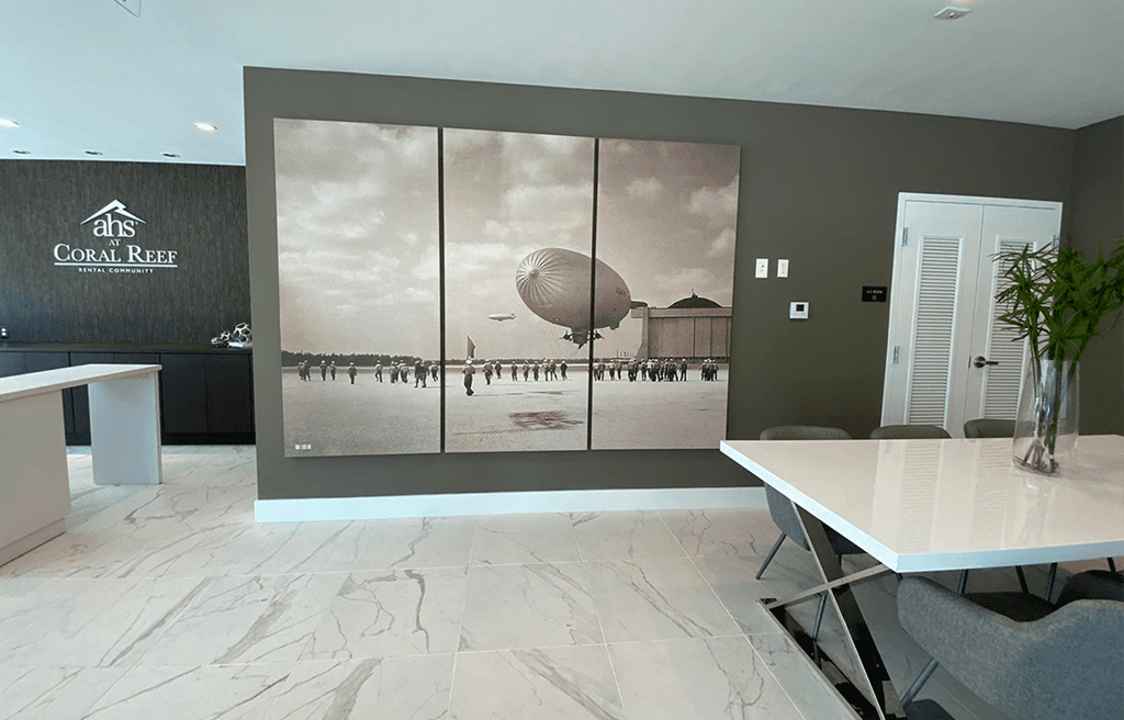 an office with a wall mural of a hot air balloon