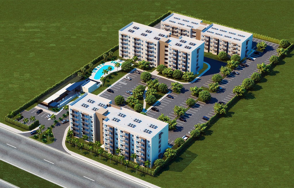 an aerial view of an apartment complex with a parking lot and a swimming pool