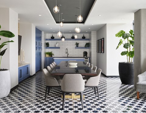 a dining room with a table and chairs and a kitchen