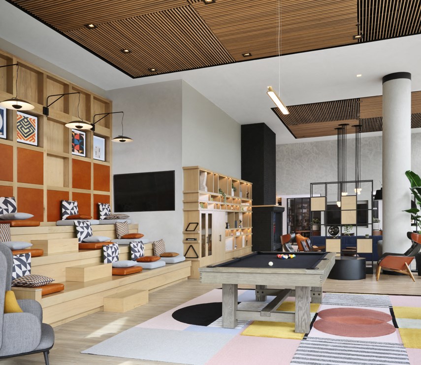 a living room filled with furniture and a pool table