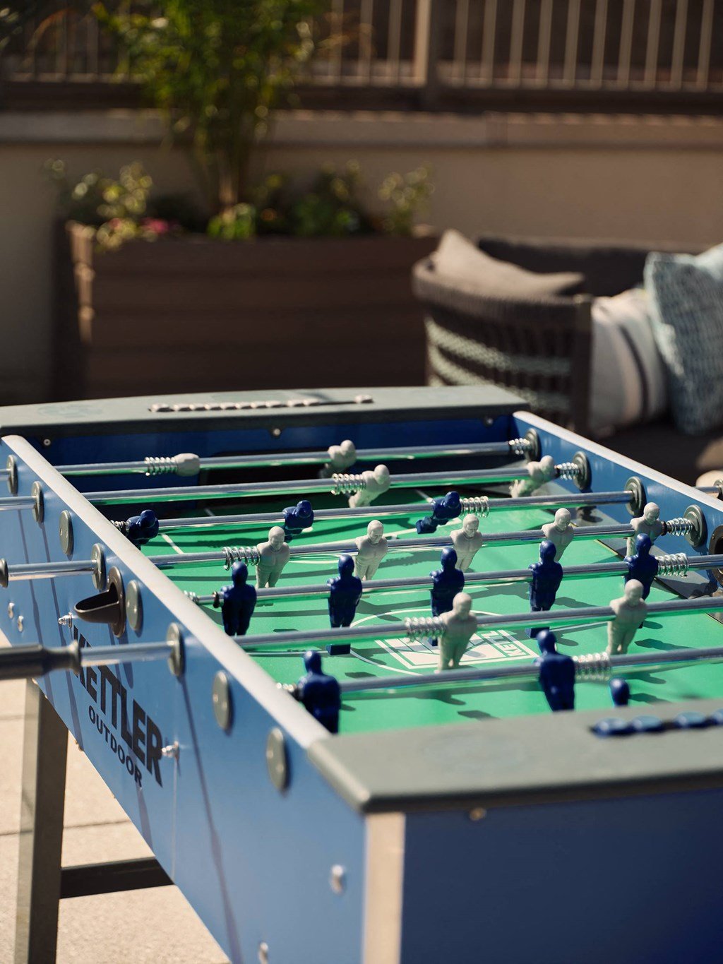 a foosball table on a table in a living room