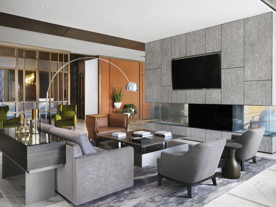 a living room filled with furniture and a television