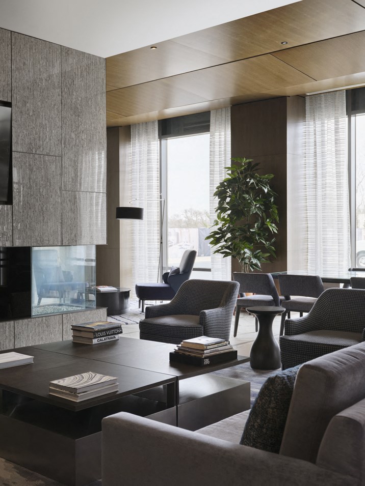 a living room with couches and chairs and a coffee table