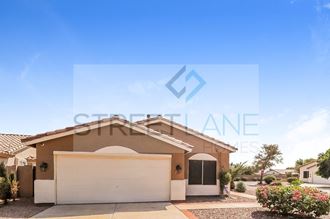 a house with a garage and a garage door