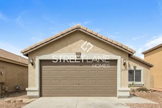 a home with a garage door with street name homes on it