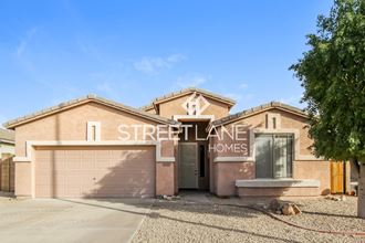 a streetline homes building with a garage door and the words street line homes on