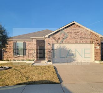 a house with a garage door with the word lane on it