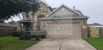 a house with a garage door with the street lane homes logo on it