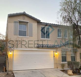 a house with a street sign on the side of it