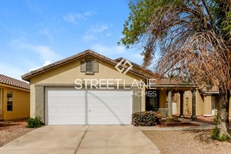 a home with a garage door with the words street alliance homes
