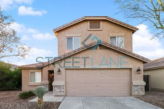 a house with a garage door with the word tenant on it