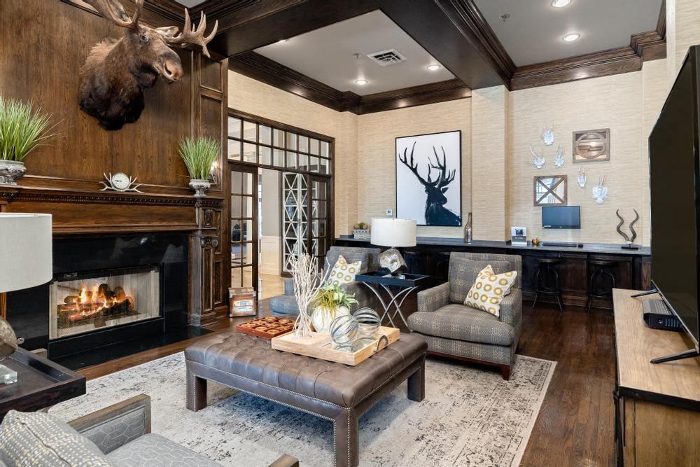 a living room filled with furniture and a fireplace