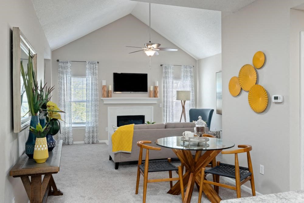 a living room with a couch and a table
