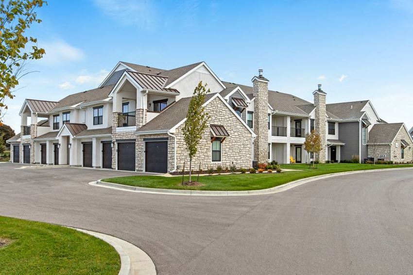 a large house with a street in front of it